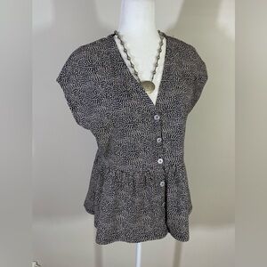 Next sz 10 top in a silky feel fabric black with white with a peplum button down